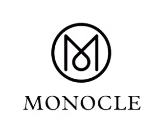 Monocle brand logo with stylized letter M inside a circle above the word Monocle.