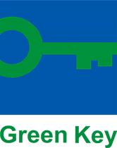 Green key icon on a blue background above the text 'Green Key'.