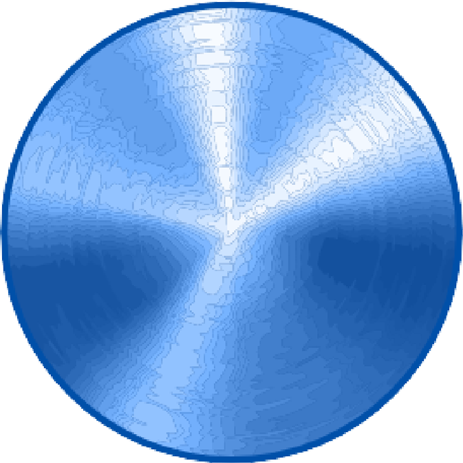 Close-up of a circular brushed stainless steel surface with radial patterns and shine.