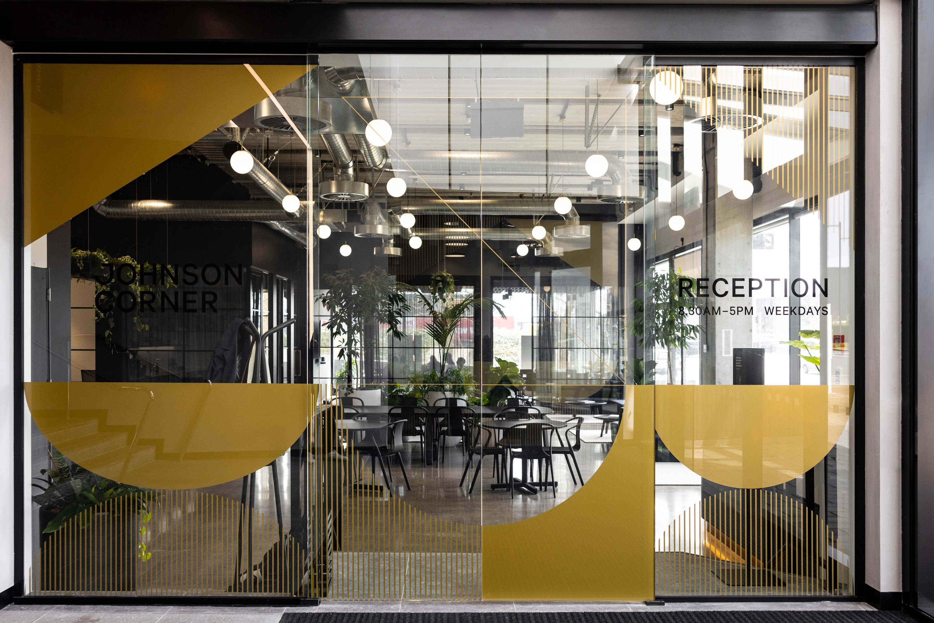 GreenAir interior plant design at Johnson Corner Auckland featuring lush greenery transforming a premium commercial space