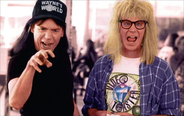 Black or colorful band t shirt is always tied to the character in a movie.