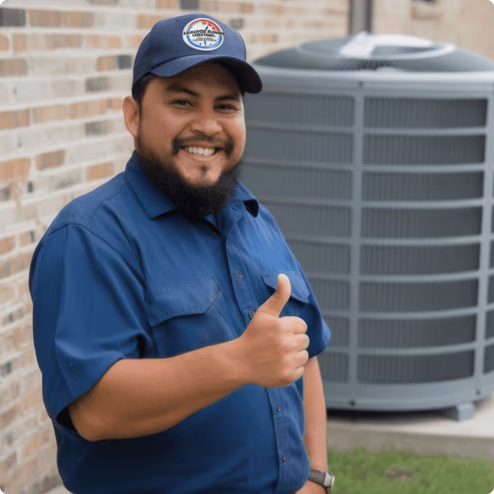 Friendly Advanced Climate Control HVAC technician giving thumbs up after AC repair in Kern County