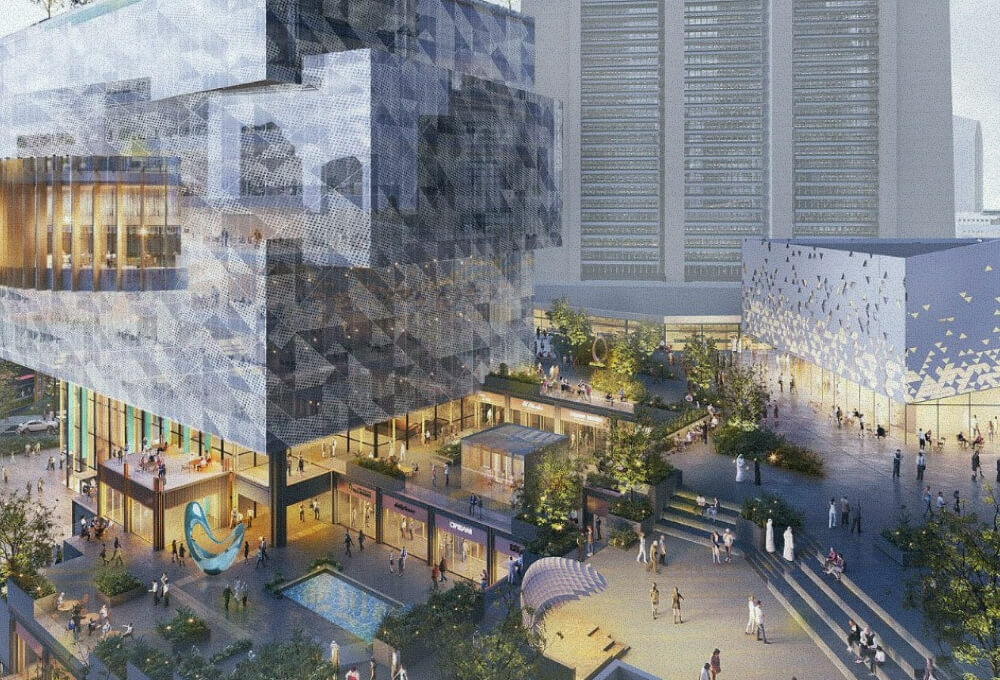 Modern office building with a busy landscaped plaza at street level