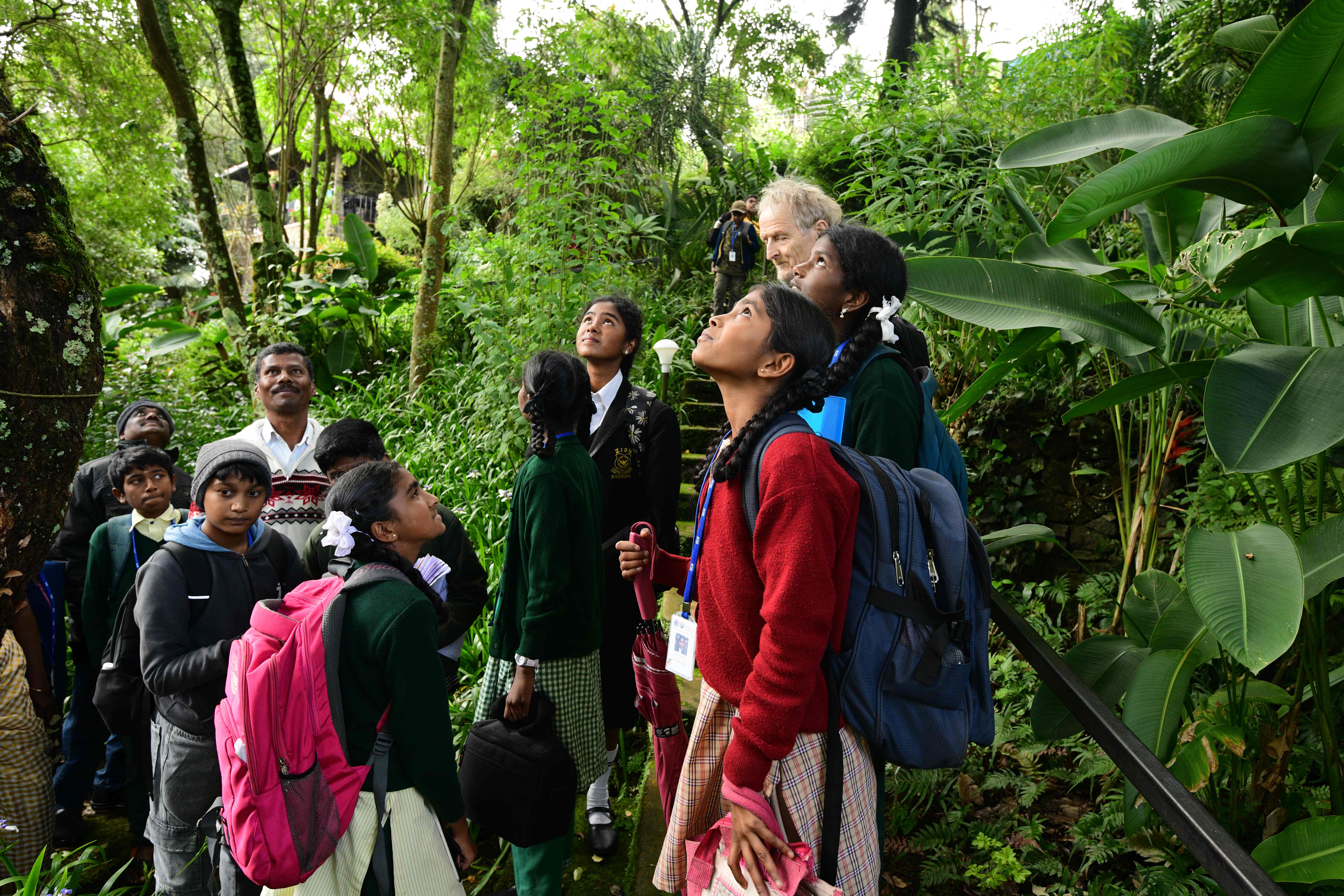 School children learning about backyard biodiversity in South India. 