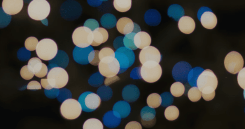 Abstract blue and white light bokeh