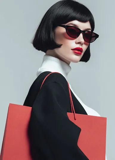 Close-up of model wearing a structured black blazer