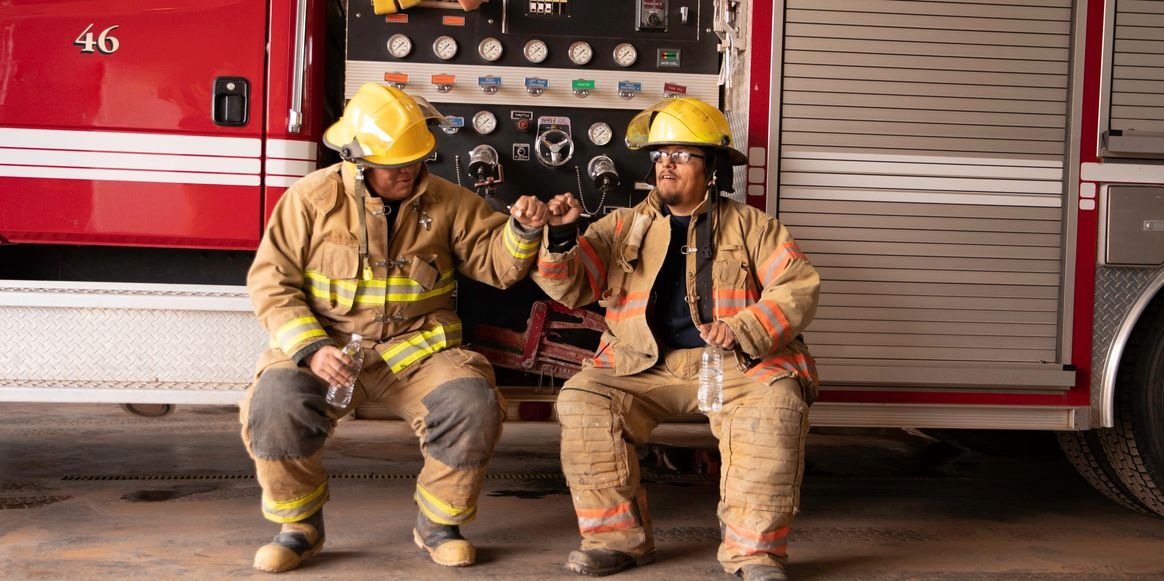 Firefighters with fire truck