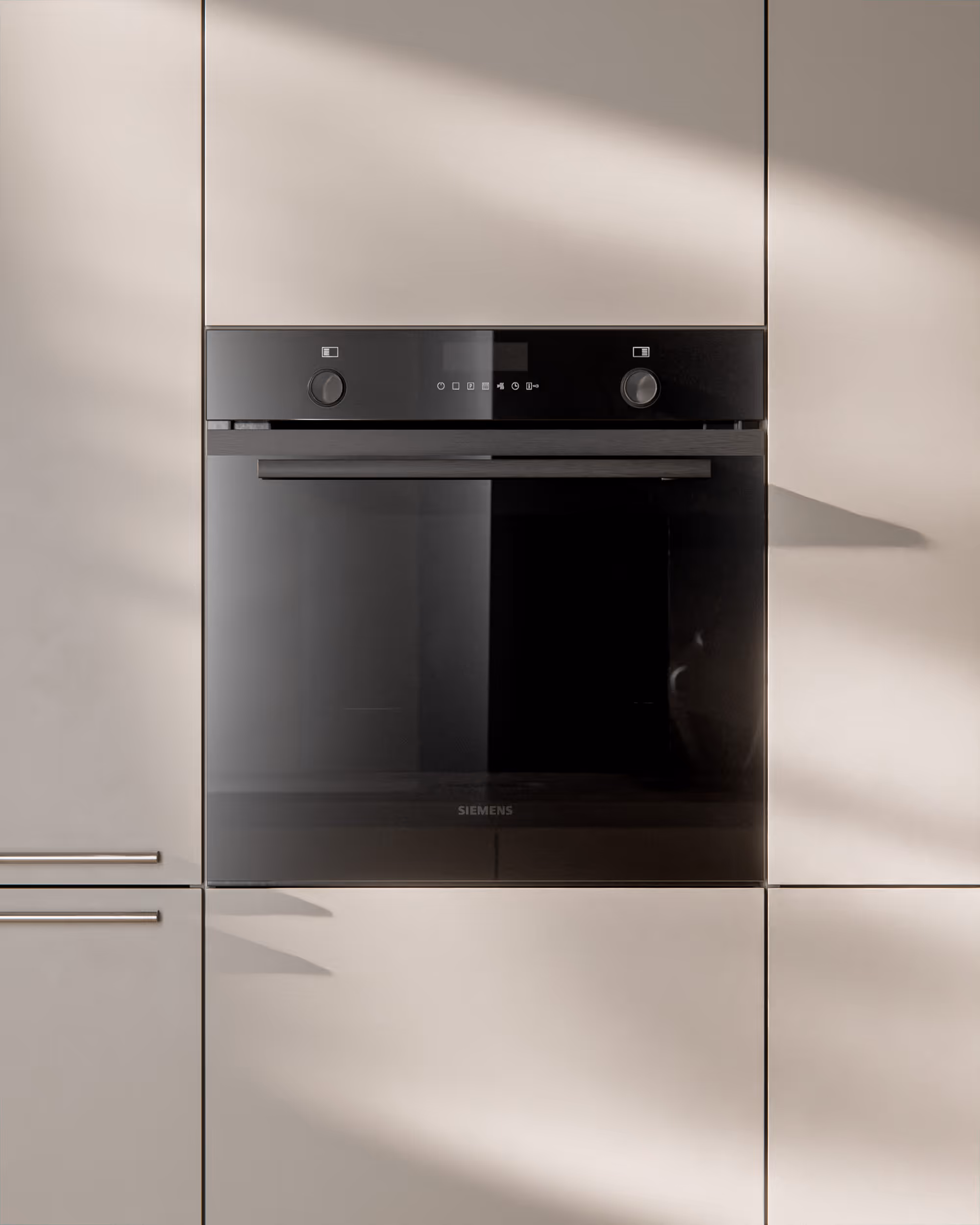 Eingebauter schwarzer Siemens-Backofen mit zwei Drehreglern in weißer Küchenfront.