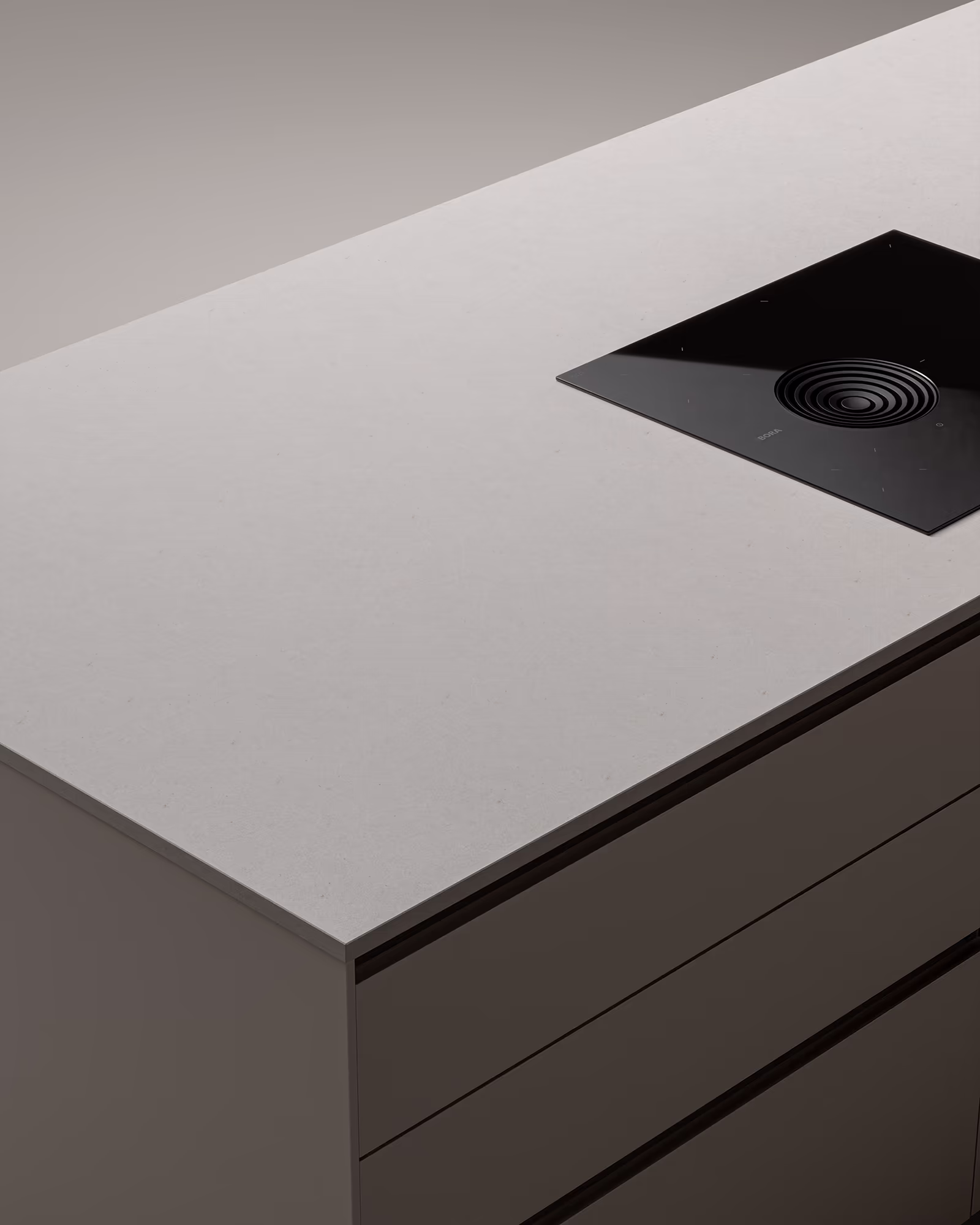 Moderner Küchenarbeitsplatte aus hellem Material mit eingebautem schwarzen Kochfeld mit integriertem Lüfter.