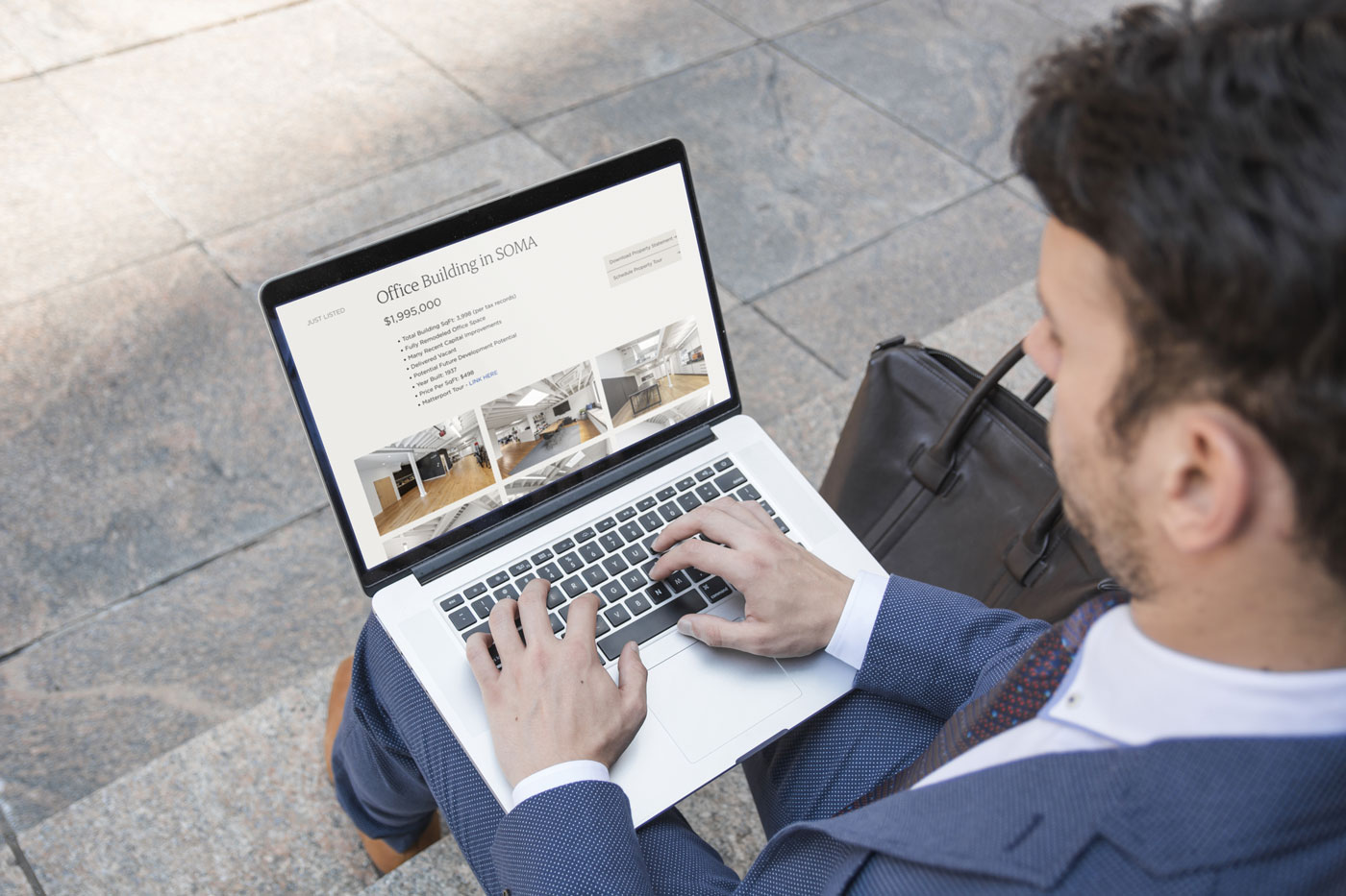 A broker looking on laptop of Allicon Chapleau's listing website page