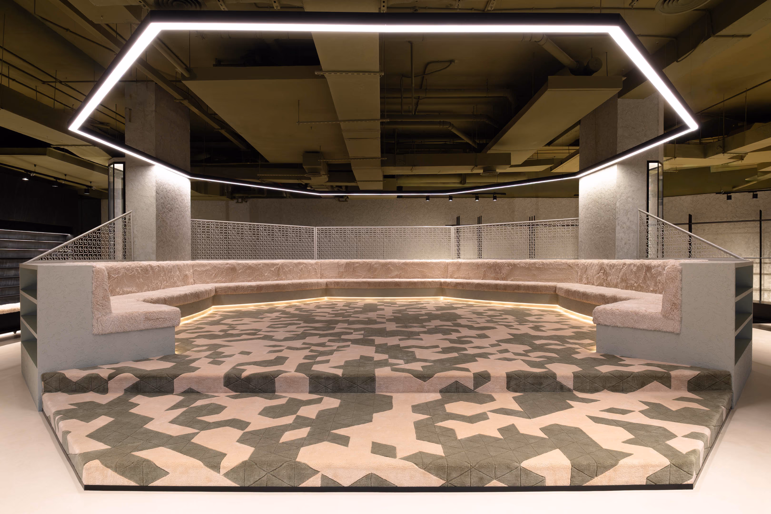 Octagonal majlis and bespoke retail displays at the Send Location flagship in Dubai.