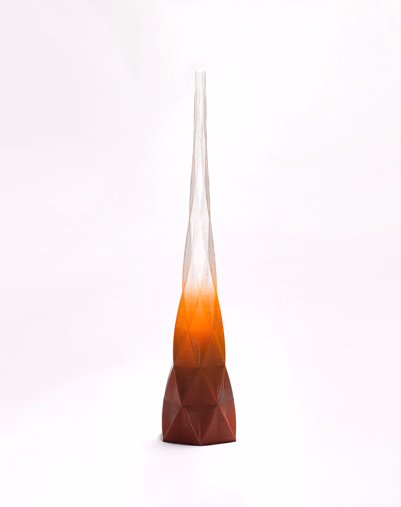 Tall gradient 3D-printed floor lamp with a faceted lattice shade.