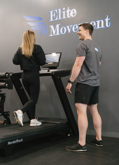  Athlete working with a performance coach during strength training at a sports performance training clinic in Winston-Salem, NC