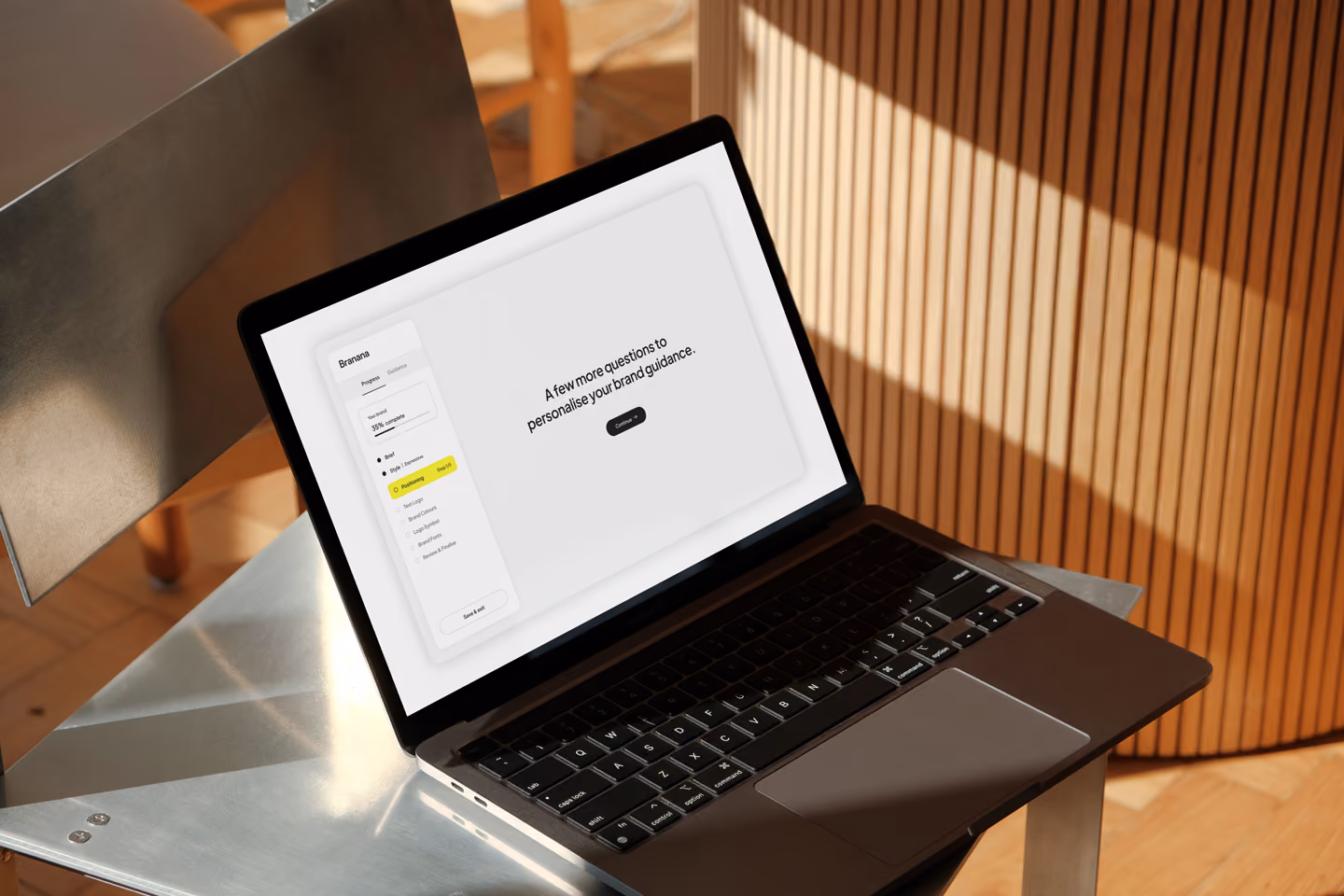 Branana's guided brand-building process on a laptop