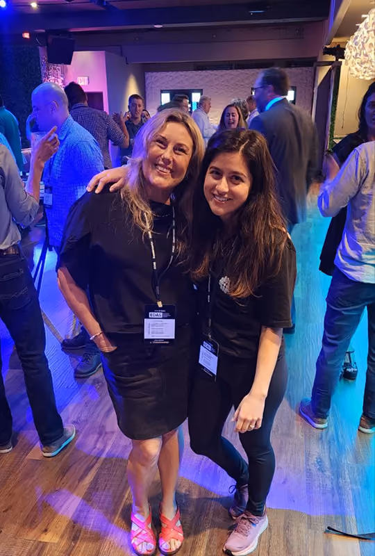 Two finance professionals networking at an OCF Institute onchain finance event