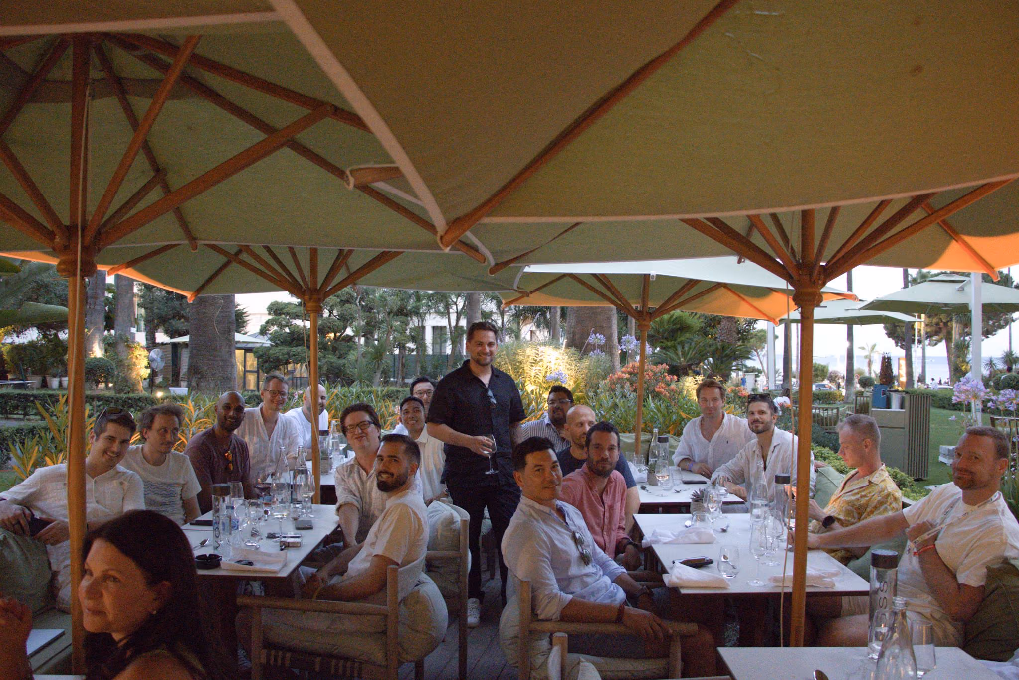 Web3 finance and accounting professionals attending an outdoor networking dinner during ETHCC in July 2025
