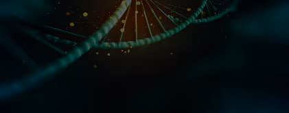 Close-up view of a glowing DNA double helix strand with floating light particles against a dark background.