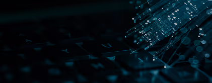 Close-up of a keyboard with abstract digital data streams symbolizing technology and connectivity.