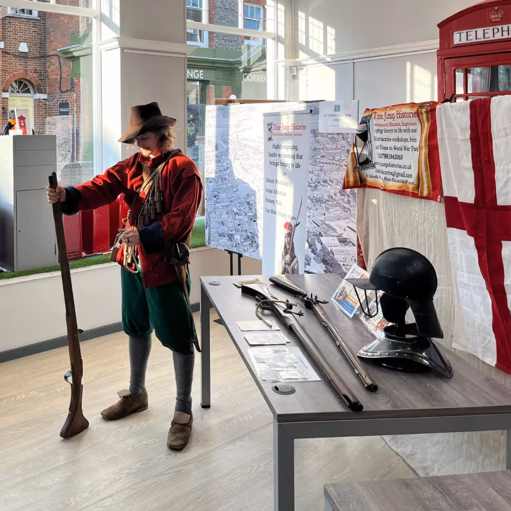 A mannequin dressed in period clothes in a museum.