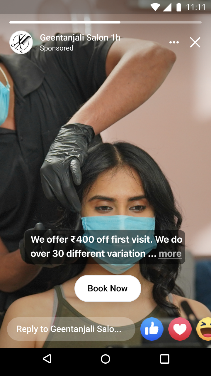 Hair stylist wearing black gloves styling a masked woman's hair in a salon promotion offering ₹400 off first visit.