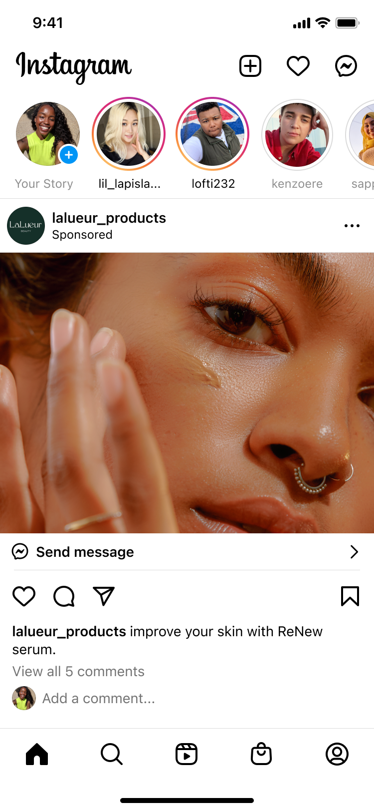 Close-up of a person with septum piercing applying serum to their cheek.