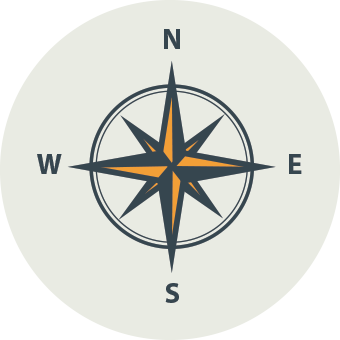Compass rose with orange and black points indicating north, south, east, and west directions.
