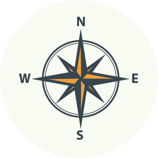Compass rose with orange and black points indicating north, south, east, and west directions.