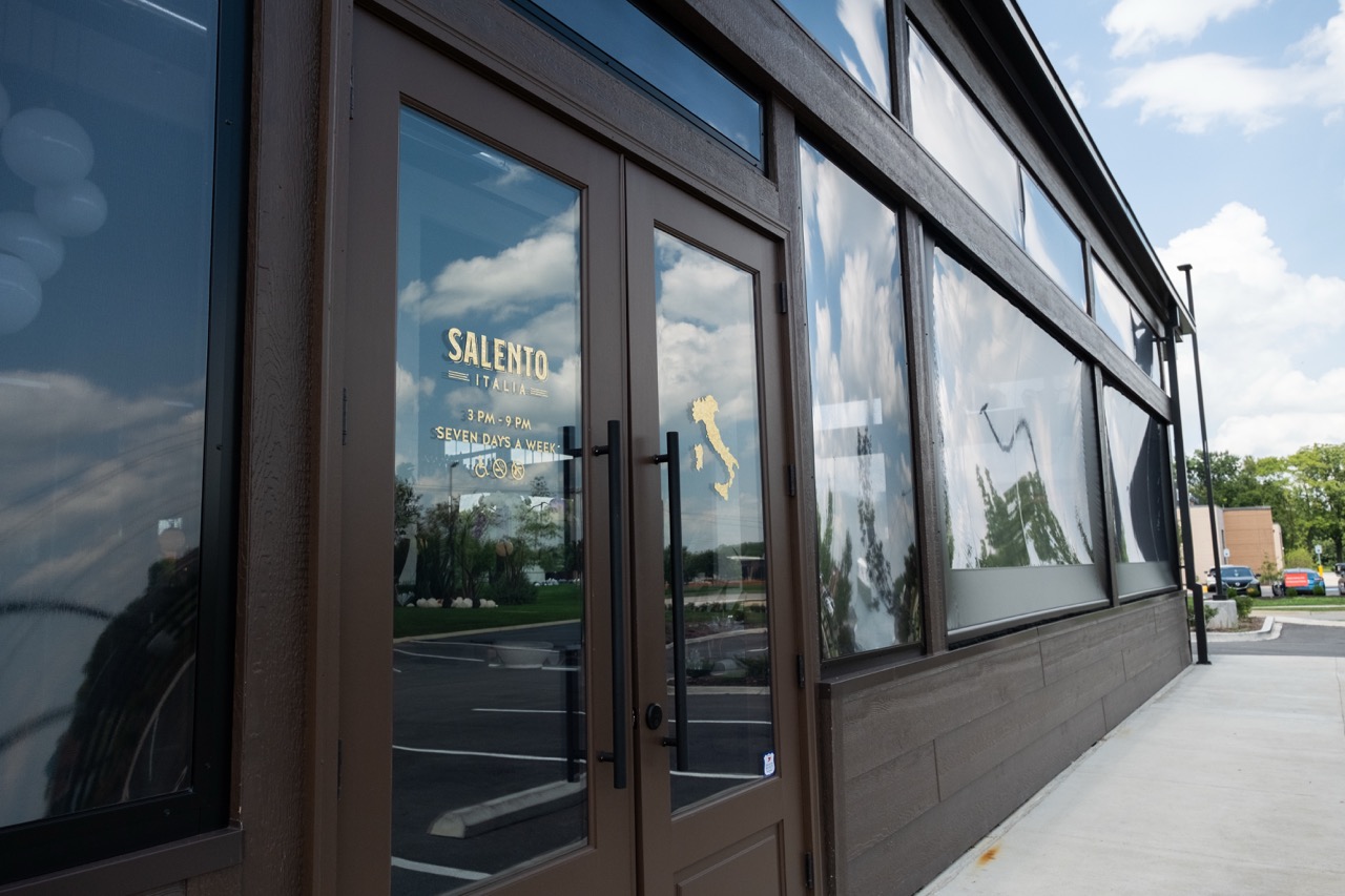 Salento Italia's front entrance with signage and glass storefront