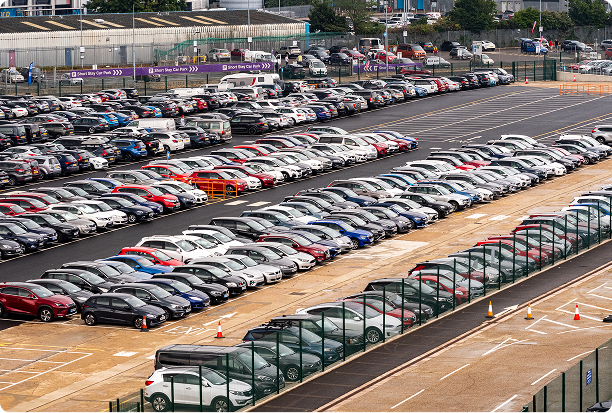 Rows of parked cars in an airport car park
