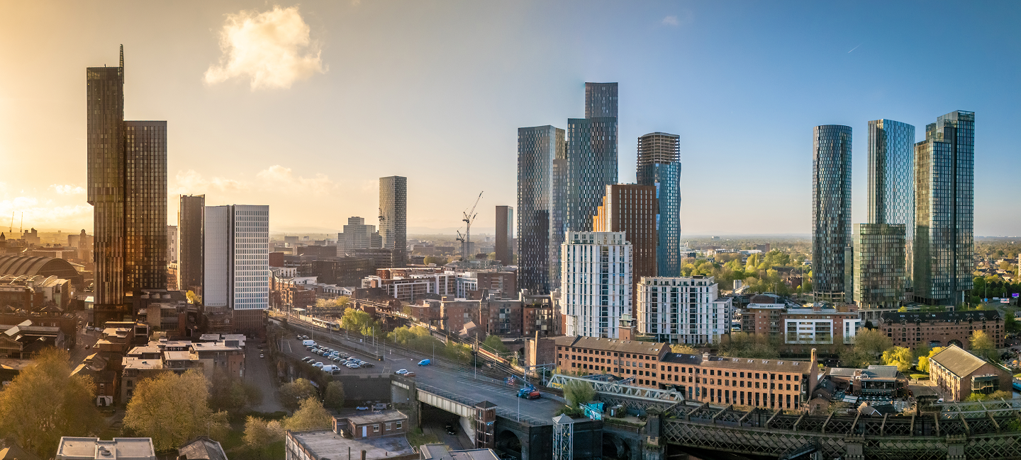 City skyline of high-rise buildings at sunset