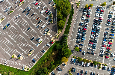 Aerial view of large car parks full of parked cars
