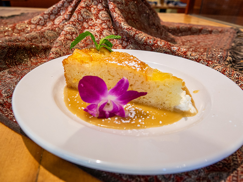 a plate of orange phyllo cake