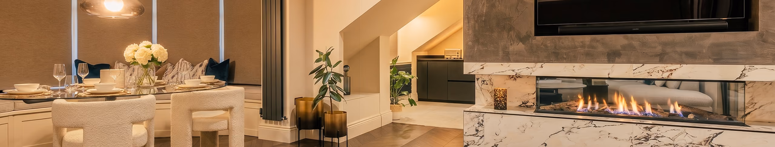 Open-plan penthouse living space with a fitted kitchen in Harrogate