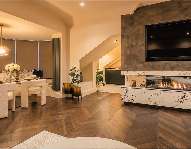 Open-plan living area with a modern fireplace at The Luxury Harrogate Penthouse