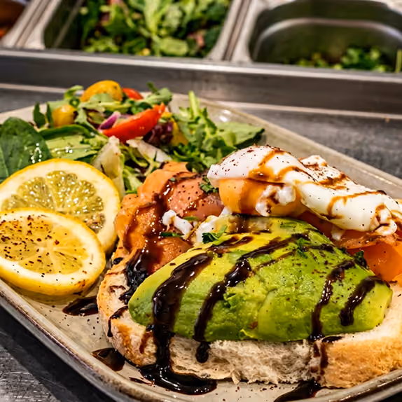 Brunch plate with avocado and salad at Nomad, Harrogate
