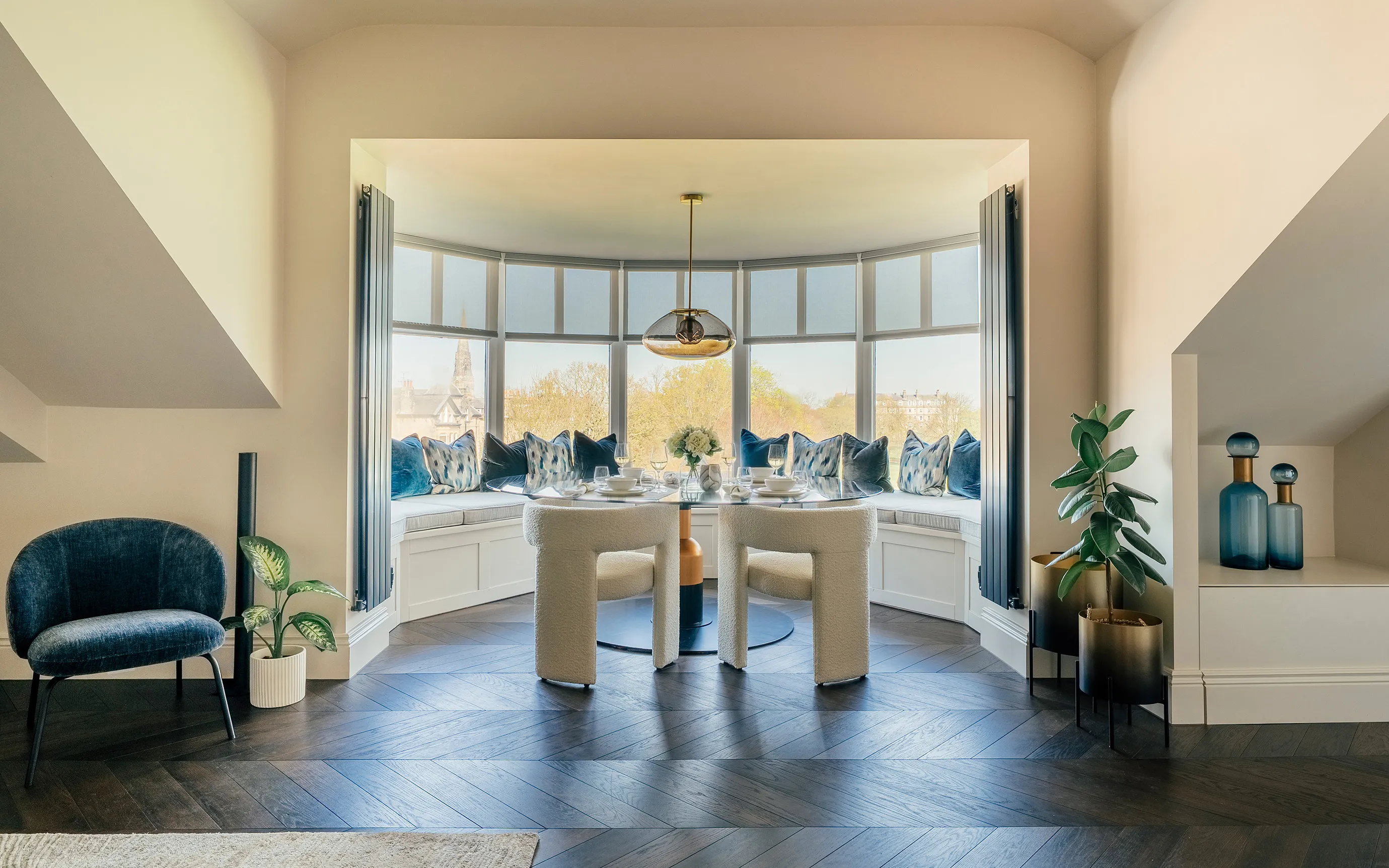Dining table in a bay window in a Harrogate apartment