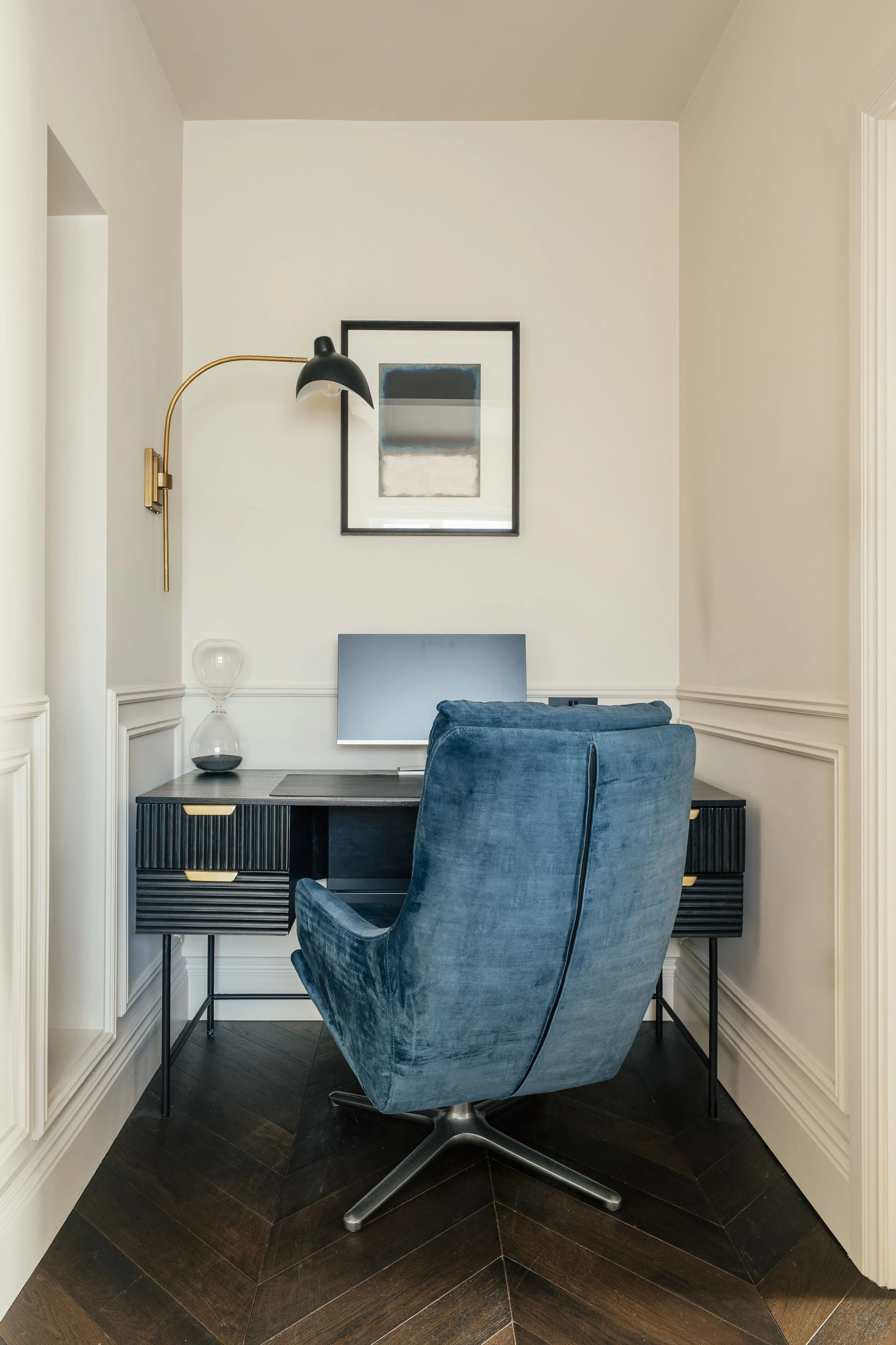 Work desk with a blue armchair in a Harrogate serviced apartment