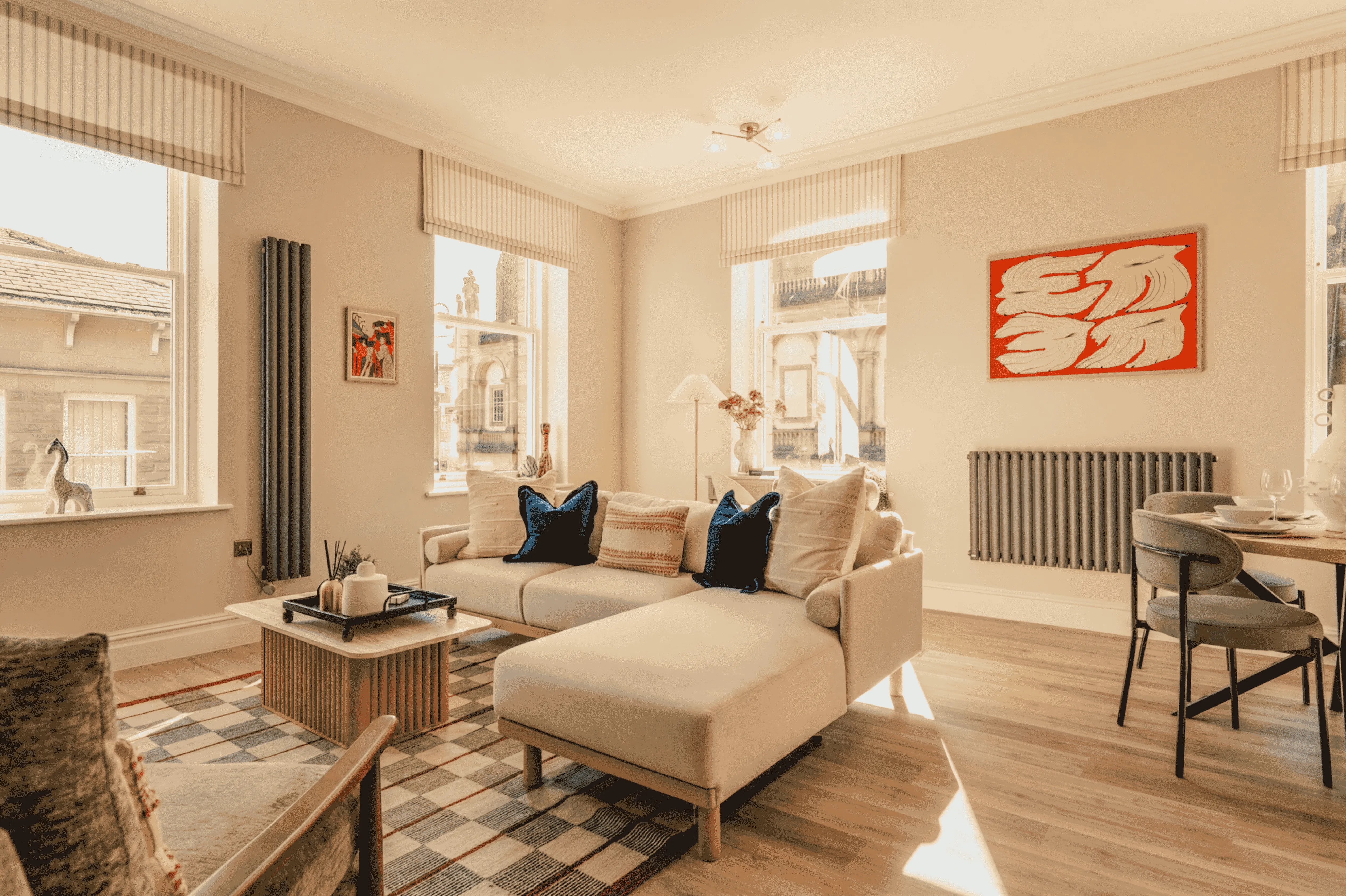 Light, modern living room with a corner sofa in a Harrogate apartment