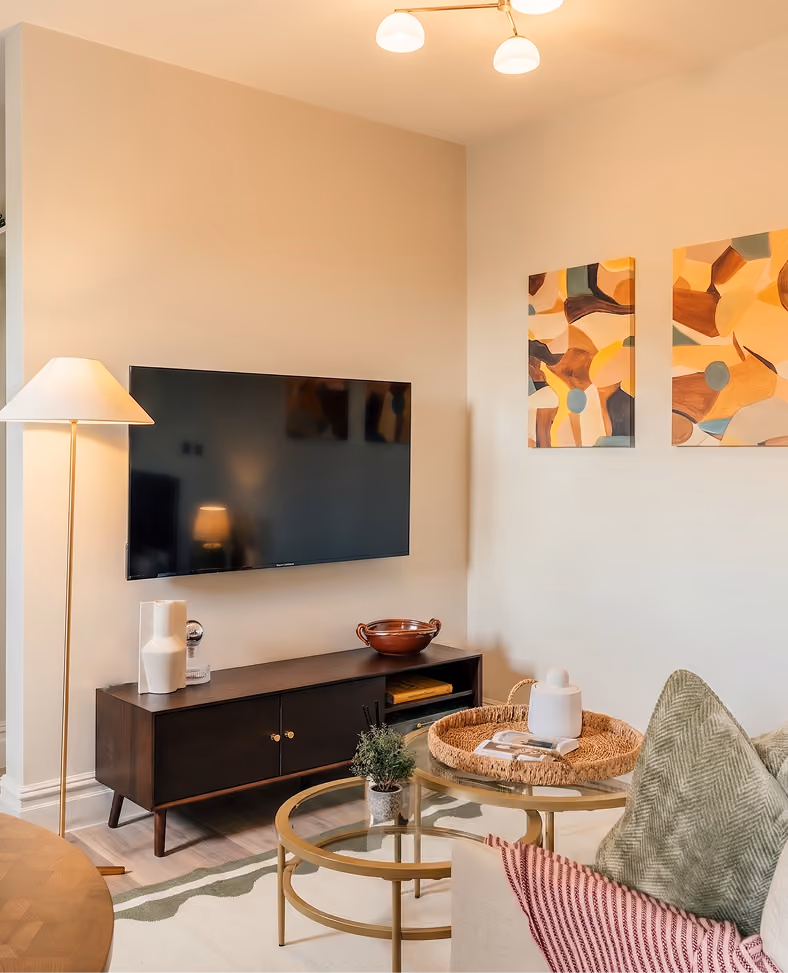Minimalist living room with abstract art in a Harrogate apartment