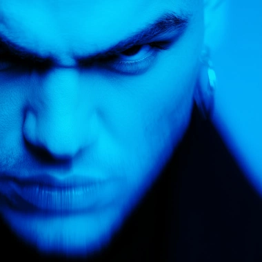 A blue tone half face portrait person