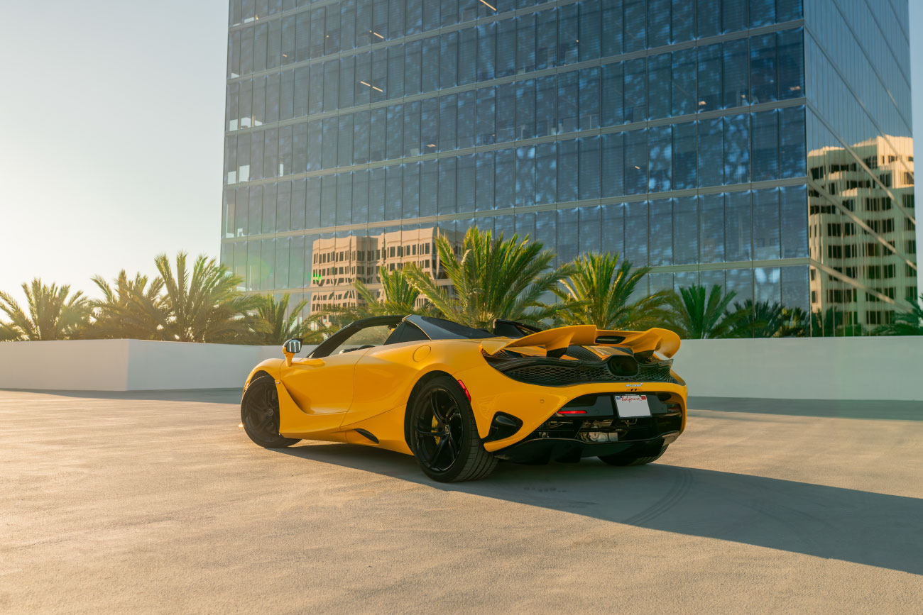 McLaren 750S Spyder Yellow rear angle supercar Pacific Coast Highway
