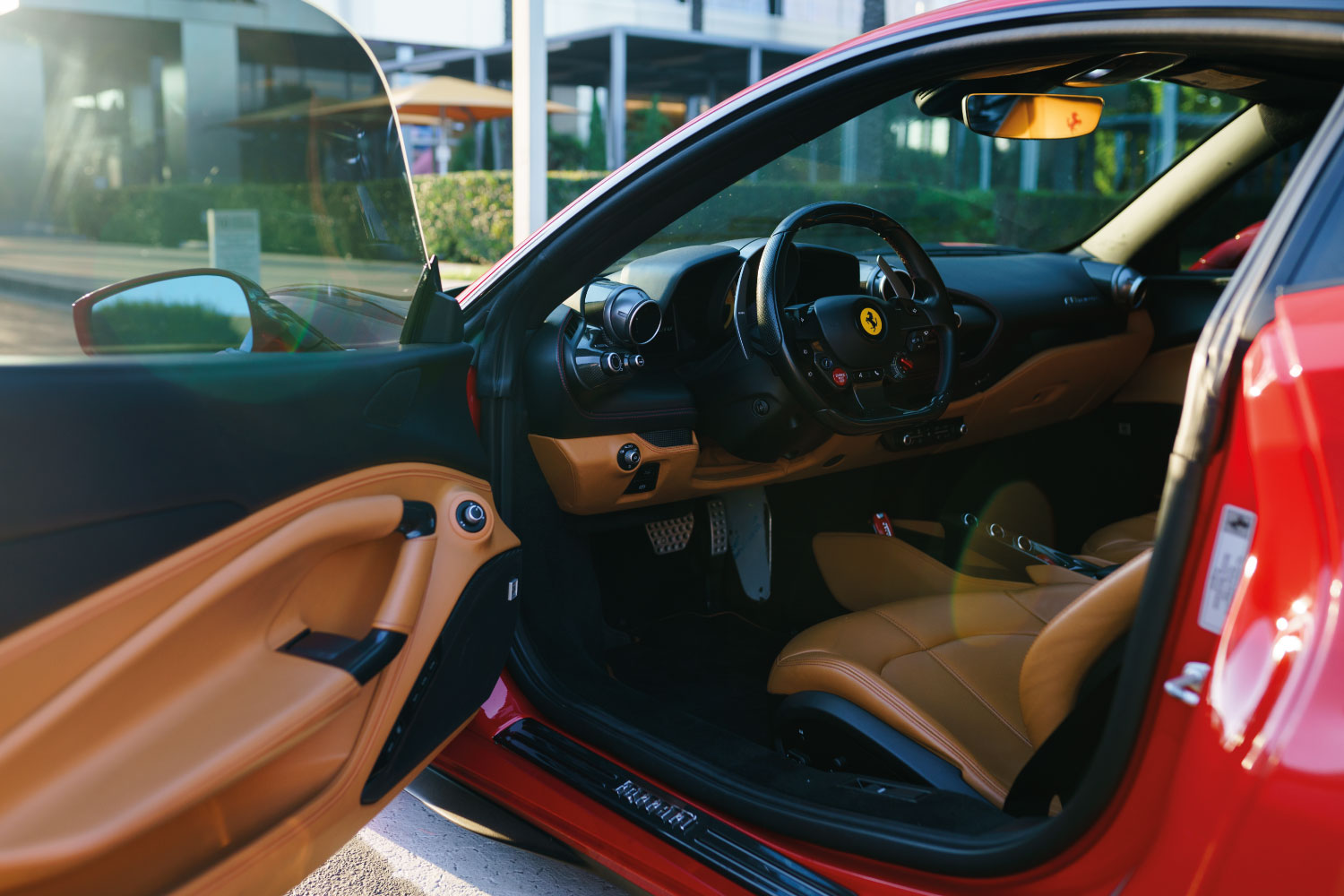 2021 Ferrari F8 Tributo Red side view Pacific Coast Highway