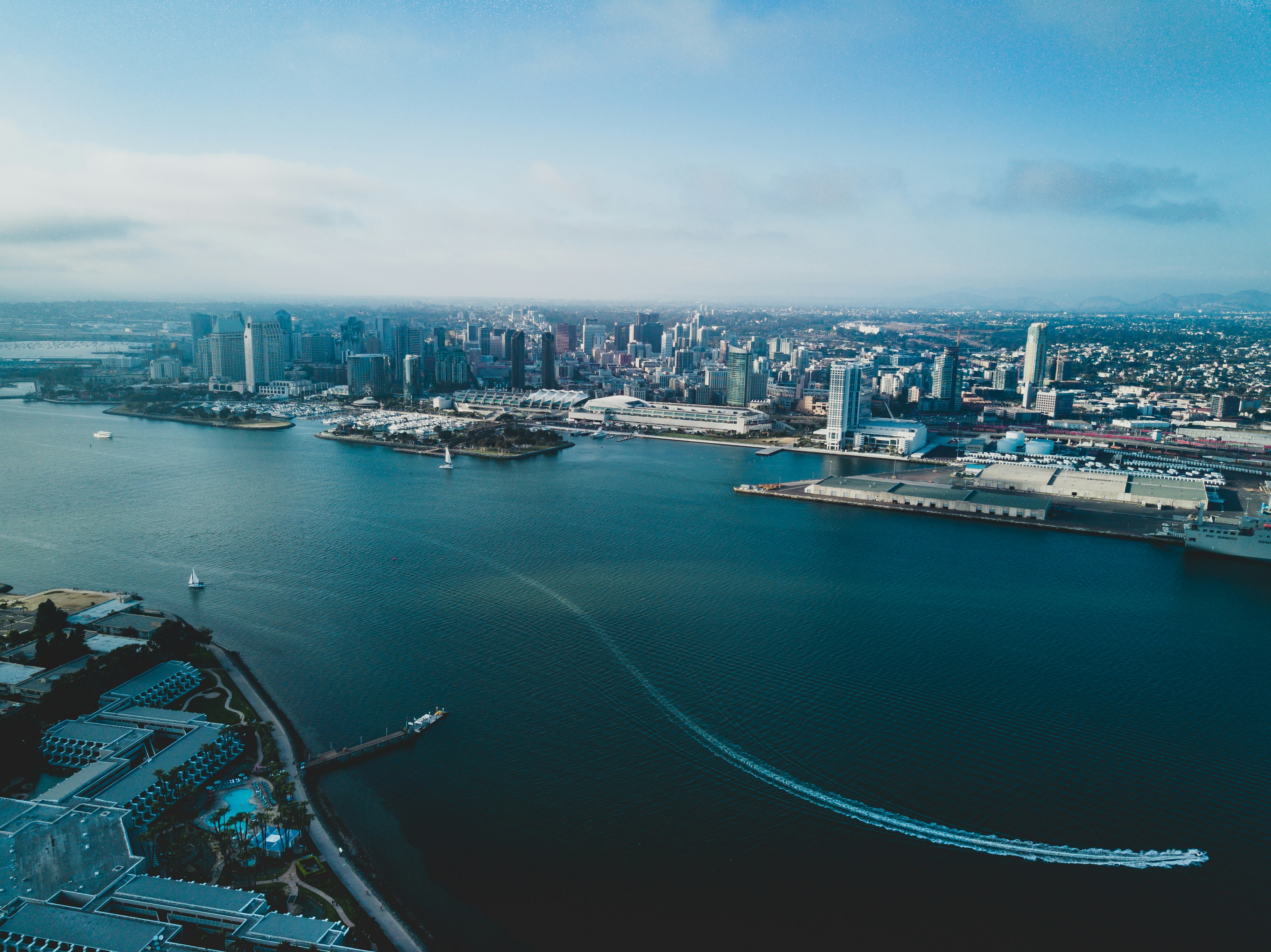 Aerial view of San Diego coastline and waterfront at golden hour