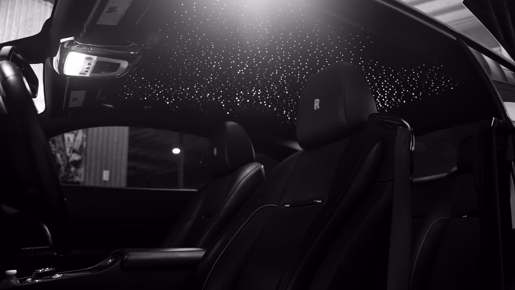 Two Tone Black Rolls Royce Wraith front quarter angle Pacific Coast Highway rental