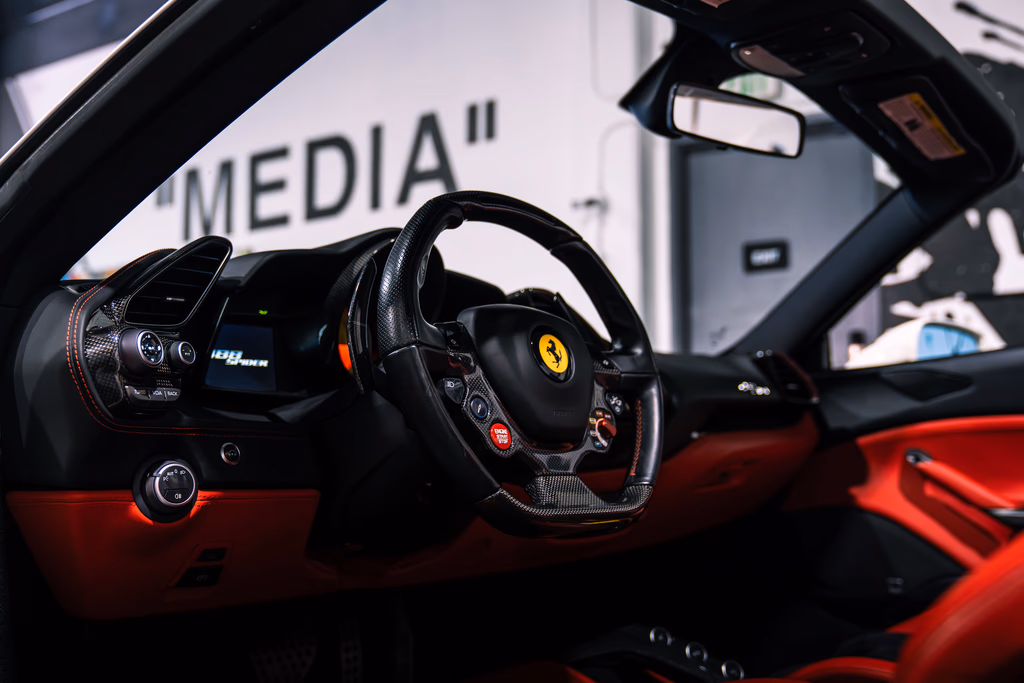 2018 Ferrari 488 Spider White rear view exotic car rental