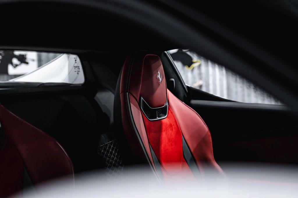 2025 Ferrari 296 GTB driver cockpit Red seats SoCal