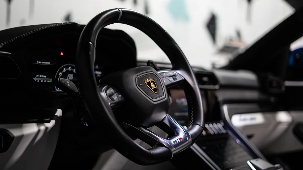 Satin Blue Lamborghini Urus front quarter angle Newport Beach rental