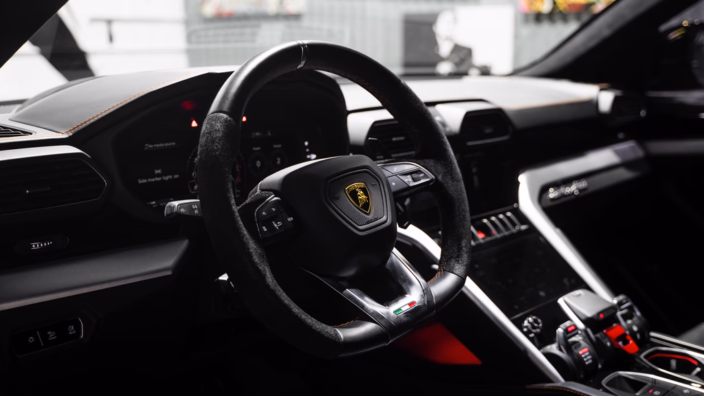 Lamborghini Urus Gloss Black rear angle luxury SUV San Diego rental