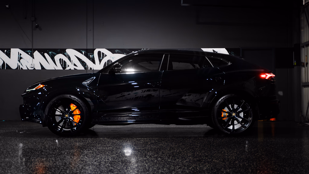 2022 Lamborghini Urus driver cockpit Black / Orange seats OC