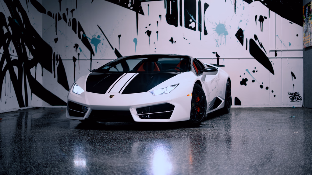 Rent a Gloss Black / White Lamborghini Huracan Spyder in San Diego
